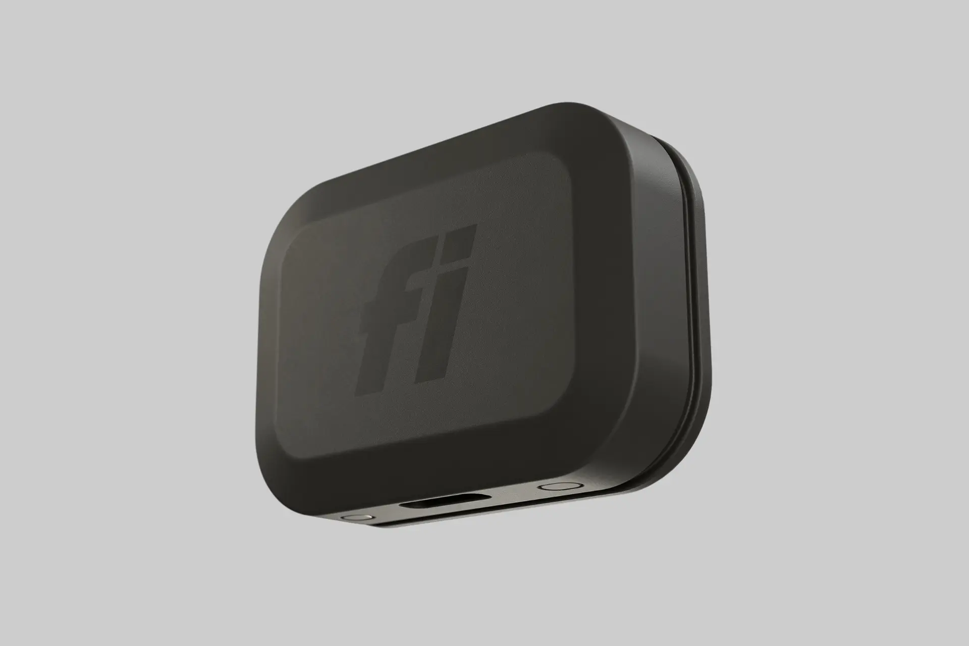 A close-up of the sleek, black Fi Mini GPS tracker clipped onto a colorful dog collar, emphasizing its compact size. - Product Review